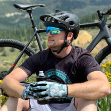 Load image into Gallery viewer, Rider wearing the Gravel Wear Pine Creek Gravel Gloves 
