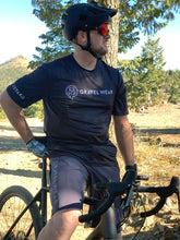 Load image into Gallery viewer, man Wearing Gravel Ride Light Jersey and shorts
