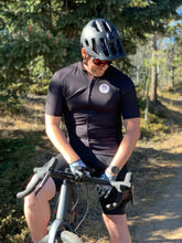 Load image into Gallery viewer, Man Wearing Gravel Wear Jersey and Bib Shorts
