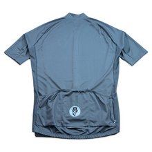 Load image into Gallery viewer, Light Blue Gravel Ride Jersey rear with pockets and logo
