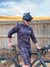 Load image into Gallery viewer, Man wearing Gravel Wear Jersey and shorts
